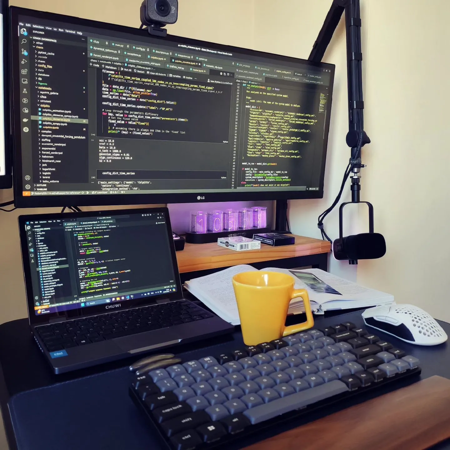 Laptop keyboard and coffee on desk